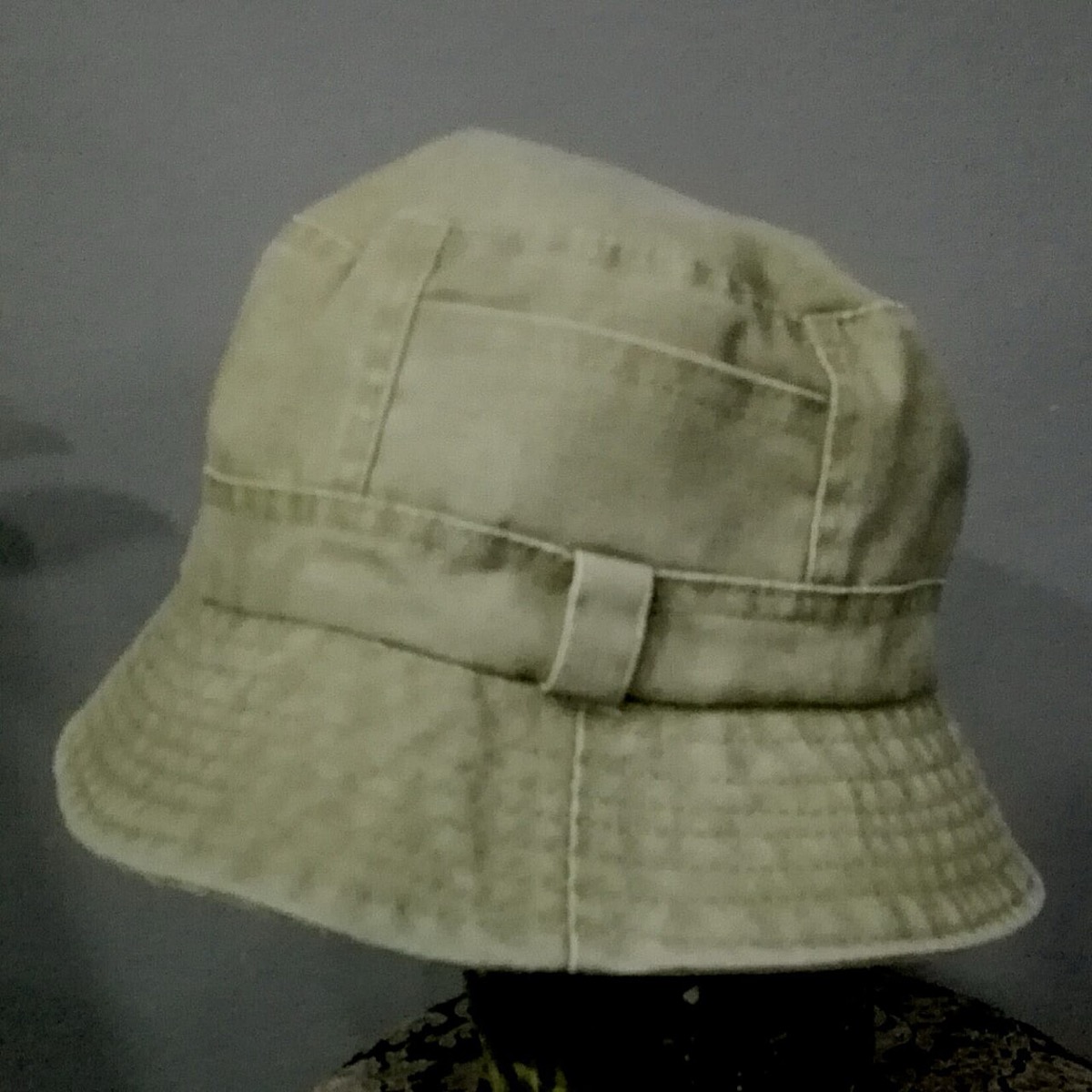 A plain khaki cotton bucket hat