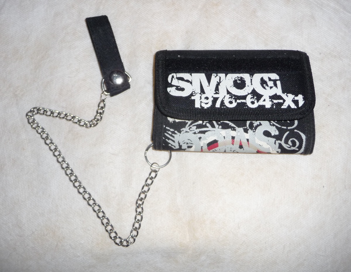 A black nylon trifold wallet with an attached metal chain and belt clip