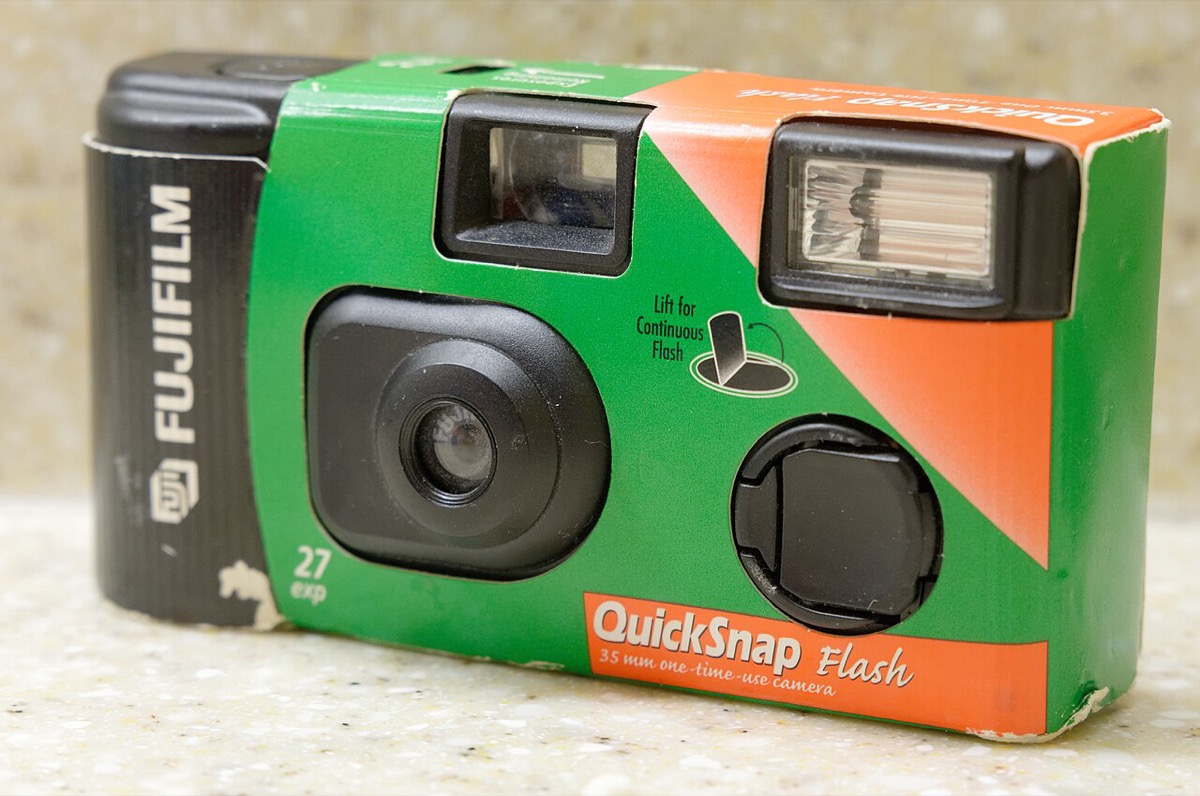 A Fujifilm QuickSnap Flash 35mm single-use camera