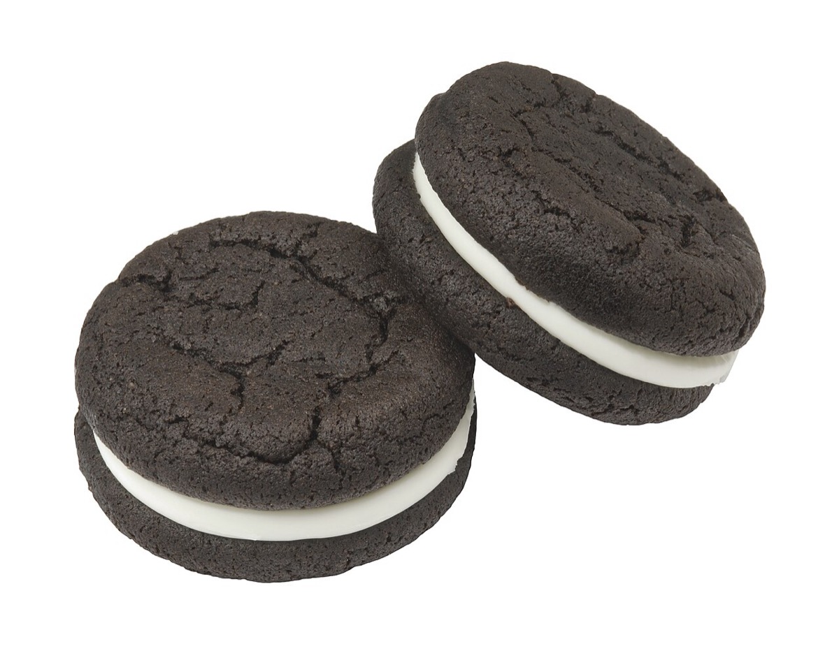 Two Oreo Cakesters soft chocolate snack cakes with white creme filling