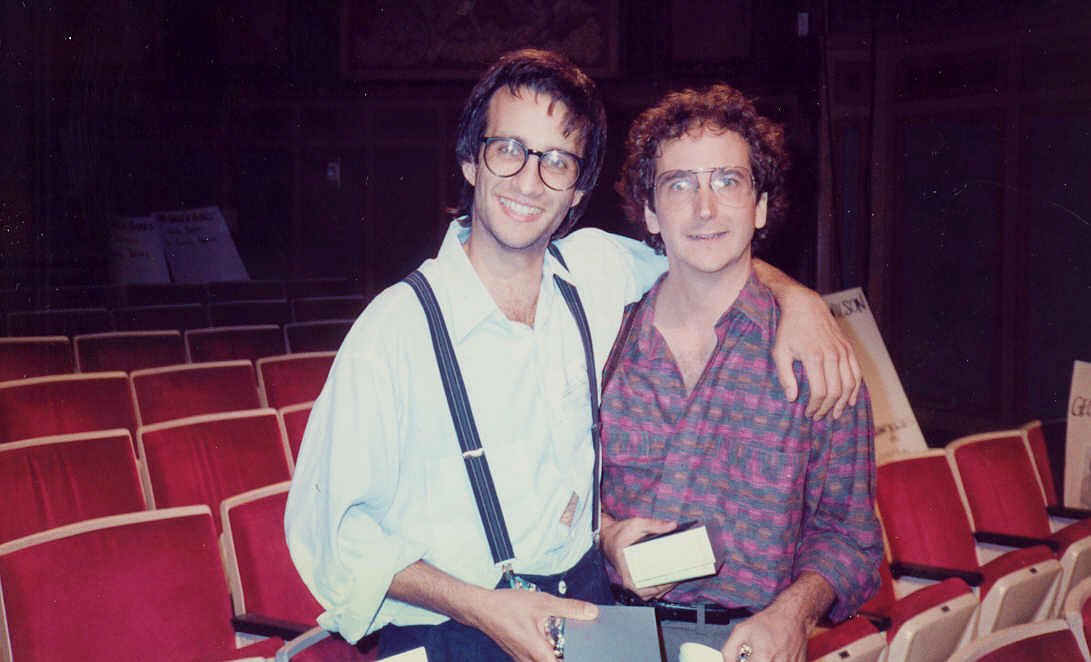 Bronson Pinchot and Mark Linn-Baker, arm in arm at a 1987 Emmy Awards rehearsal