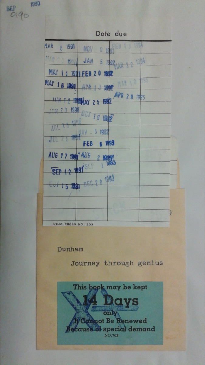 A library book's date-due slip stamped with due dates from 1990 to 1995, above the manila card pocket in the back cover