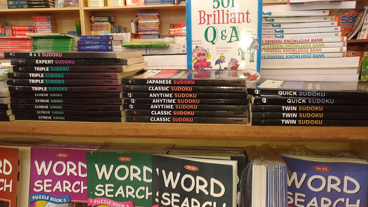 Bookshop shelves stacked with sudoku puzzle books