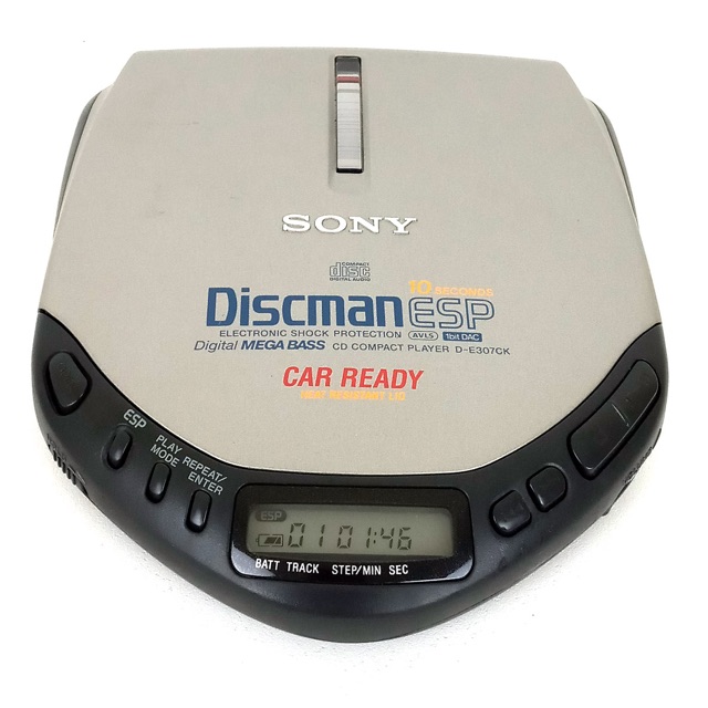 A Sony Discman ESP D-E307CK portable CD player, viewed from above with the lid closed
