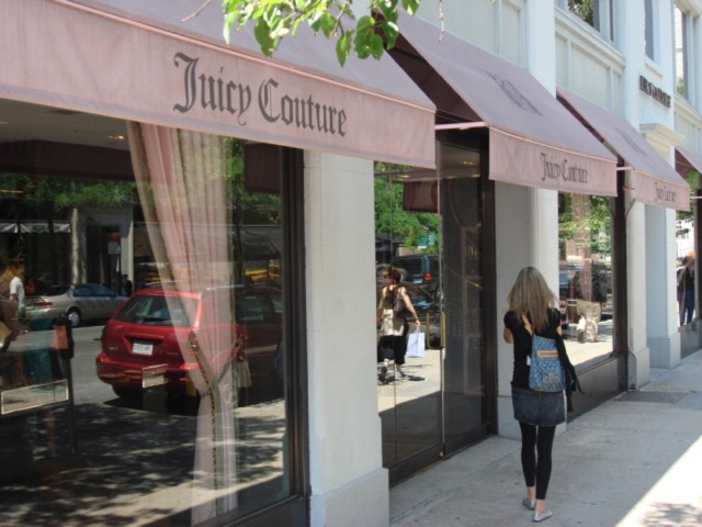 a Juicy Couture boutique with pink awnings