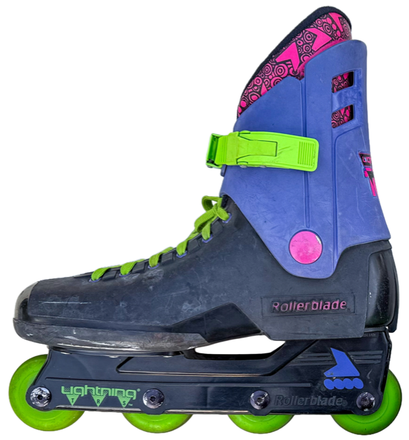 A Rollerblade Lightning TRS inline skate from 1988 in purple, black, and neon green — peak rollerblading aesthetic