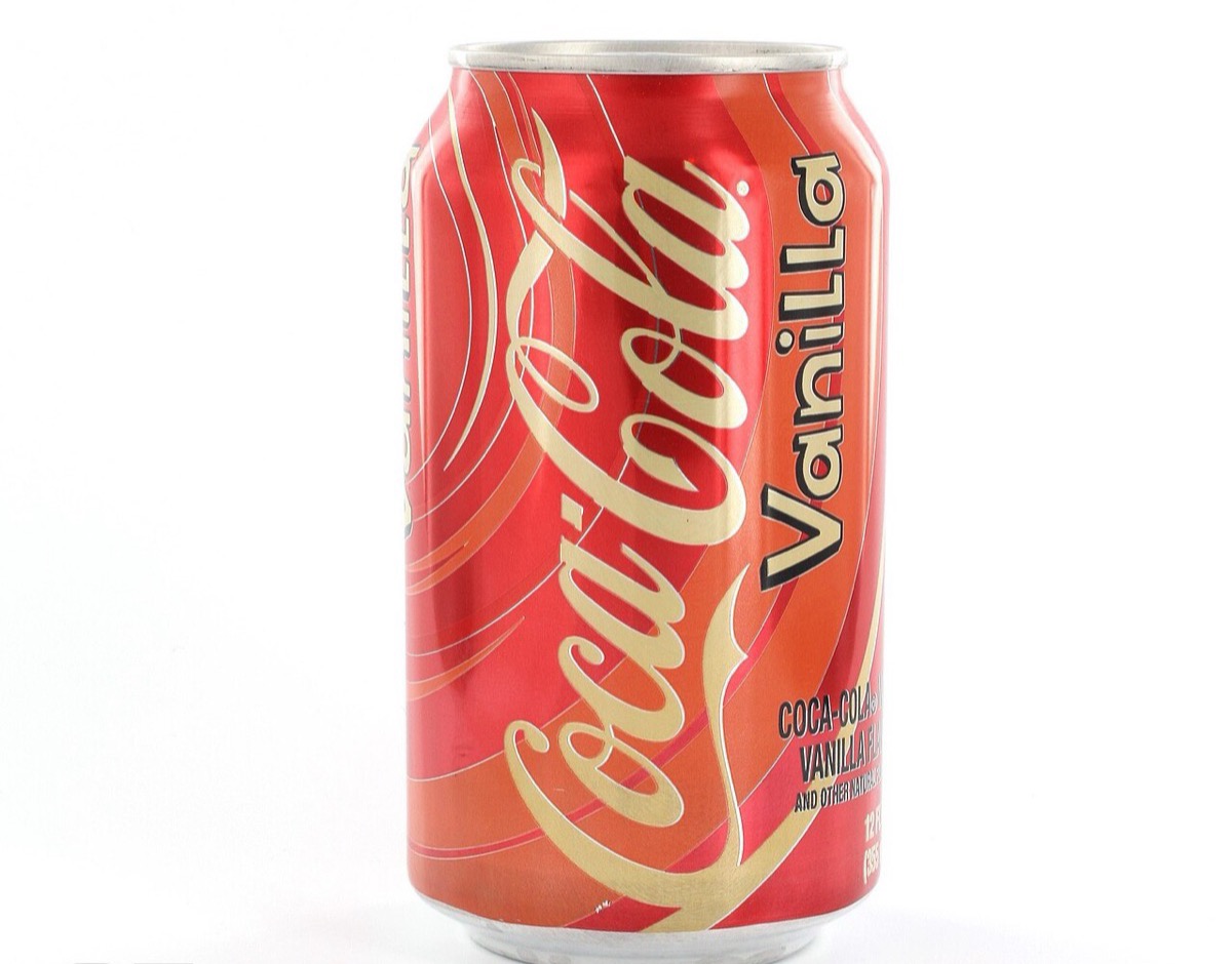 A 2002-era Vanilla Coke can with the gold cursive Vanilla script